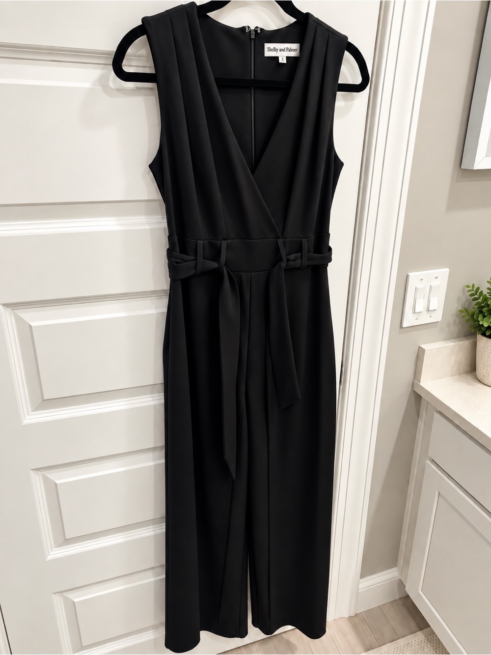Elegant black wide legged black jumpsuit